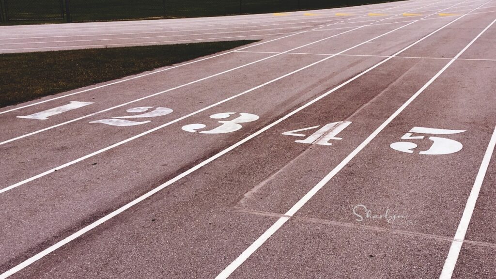 running track 5 lanes representing topics in recruiting strategy meetings