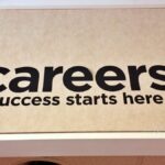 wall sign career success staying relevant