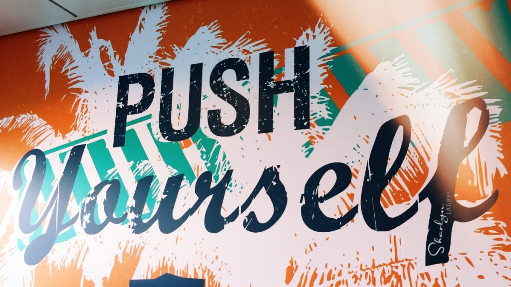 wall graphic push yourself in employee performance conversations